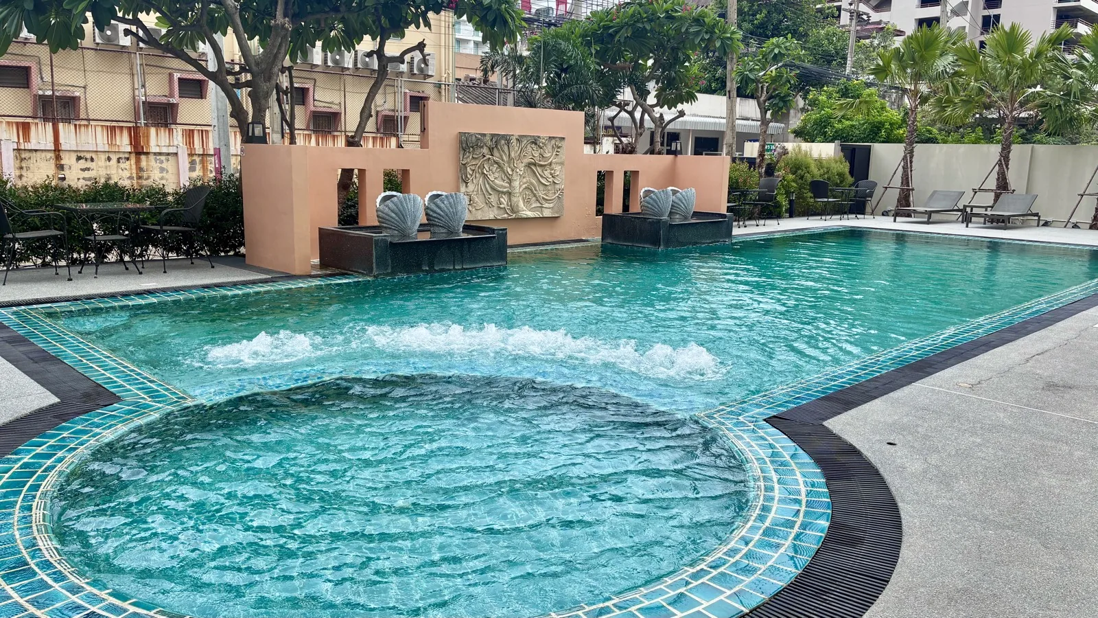 Outdoor pool with kids' pool and jacuzzi