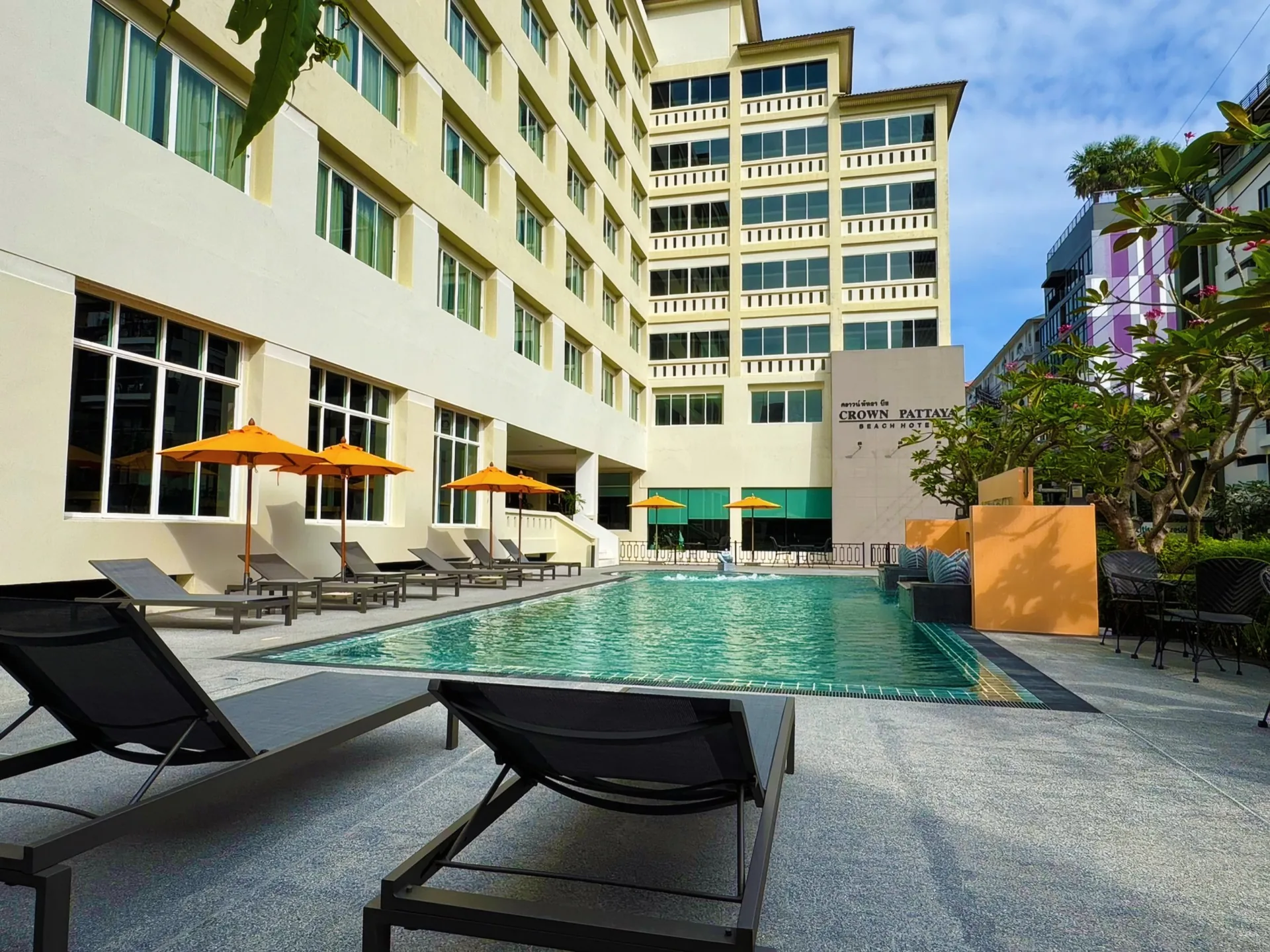 Crown Pattaya Beach Hotel pool and building